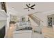 Spacious living room with hardwood floors open to the kitchen at 5247 Flannery Chase Sw, Powder Springs, GA 30127