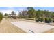 Enjoy friendly competition on the community's sand volleyball court, surrounded by lush green space and benches at 5247 Flannery Chase Sw, Powder Springs, GA 30127