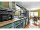 Bright kitchen showcases ample counter space, stainless steel appliances, and a window view at 671 Shannon Green Sw Cir, Mableton, GA 30126