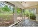 Screened in porch featuring a great view of the backyard and foliage at 671 Shannon Green Sw Cir, Mableton, GA 30126