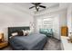 Bright bedroom with a gray padded headboard and a bay window overlooking the front yard at 951 Glenwood Se Ave # 1805, Atlanta, GA 30316