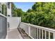 Outdoor deck providing a tranquil view of the surrounding trees at 951 Glenwood Se Ave # 1805, Atlanta, GA 30316