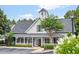 Exterior view of clubhouse, with large lawn and parking spaces at 951 Glenwood Se Ave # 1805, Atlanta, GA 30316