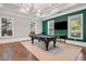 Stylish game room featuring a billiard table, flat-screen TV, and contemporary lighting at 951 Glenwood Se Ave # 1805, Atlanta, GA 30316