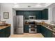 Well-appointed kitchen with stainless steel appliances and granite countertops at 951 Glenwood Se Ave # 1805, Atlanta, GA 30316