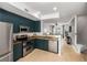 Modern kitchen with stainless steel appliances, granite countertops, and hardwood floors at 951 Glenwood Se Ave # 1805, Atlanta, GA 30316