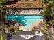 Aerial view of a large community swimming pool surrounded by lounge chairs and lush landscaping at 951 Glenwood Se Ave # 1805, Atlanta, GA 30316