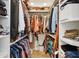 Walk-in closet with lots of hanging storage and shelving at 3533 Keswick Dr, Atlanta, GA 30341