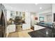 Well-lit kitchen with stainless steel appliances, stone countertops, and tile backsplash at 3533 Keswick Dr, Atlanta, GA 30341