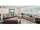 Bright living room with hardwood floors, plantation shutters, neutral paint, and stylish furnishings at 3533 Keswick Dr, Atlanta, GA 30341