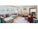 Bright living room with hardwood floors, plantation shutters, neutral paint, and stylish furnishings at 3533 Keswick Dr, Atlanta, GA 30341