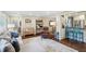 Bright living room with hardwood floors, plantation shutters, neutral paint, and stylish furnishings at 3533 Keswick Dr, Atlanta, GA 30341