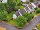 Aerial view of home with fenced-in yard and pool backing up to neighboring house at 1185 Charter Club Dr, Lawrenceville, GA 30043