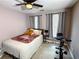 Bedroom with carpet, ceiling fan, and neutral tones at 1185 Charter Club Dr, Lawrenceville, GA 30043