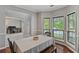 Formal dining room features a bay window with lots of natural light and views to the outside at 1185 Charter Club Dr, Lawrenceville, GA 30043