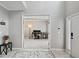 Welcoming foyer with neutral walls and view into adjacent room perfect for an office at 1185 Charter Club Dr, Lawrenceville, GA 30043