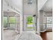 Inviting foyer with an open front door, tall ceilings, and views into the adjacent rooms at 1185 Charter Club Dr, Lawrenceville, GA 30043