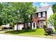 Beautiful brick home featuring a two-car garage and lush green lawn at 1185 Charter Club Dr, Lawrenceville, GA 30043