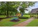 Playground with slide and swings near picnic tables and shelter at 1185 Charter Club Dr, Lawrenceville, GA 30043