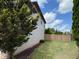 View of a backyard featuring a privacy fence and lawn at 1307 Clarecastle Ln, Buford, GA 30519