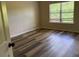 A modern bedroom featuring a window that fills the room with natural light at 1307 Clarecastle Ln, Buford, GA 30519