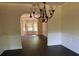 View of the formal dining room, flowing into the breakfast nook at 1307 Clarecastle Ln, Buford, GA 30519