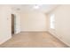 Bedroom with a ceiling fan, a window, carpet floors, and neutral walls at 2279 Hawks Bluff Trl, Lawrenceville, GA 30044