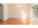 Bright dining room with a sliding glass door to the outside at 2279 Hawks Bluff Trl, Lawrenceville, GA 30044