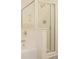 Modern bathroom shower features glass enclosure and chrome fixtures at 2279 Hawks Bluff Trl, Lawrenceville, GA 30044