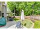 Backyard patio set, a grill, and wood fence providing privacy at 352 Hickory Haven Ter, Suwanee, GA 30024