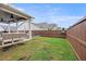 Fenced backyard with well manicured lawn at 39 Summer Nw Pl, Cartersville, GA 30121