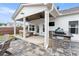 Covered patio includes outdoor kitchen and seating area at 39 Summer Nw Pl, Cartersville, GA 30121