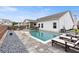 Backyard with swimming pool, lounge chairs, patio, outdoor kitchen and landscaping at 39 Summer Nw Pl, Cartersville, GA 30121