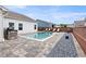 Backyard with swimming pool, lounge chairs, patio, outdoor kitchen and landscaping at 39 Summer Nw Pl, Cartersville, GA 30121