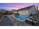 Backyard with swimming pool, lounge chairs, patio, outdoor kitchen and landscaping at 39 Summer Nw Pl, Cartersville, GA 30121