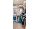 Walk-in closet with organized hanging clothes and neatly folded items at 39 Summer Nw Pl, Cartersville, GA 30121