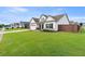 Lovely one-story home with a green lawn, fenced yard, and a two-car garage, showcasing a suburban setting at 39 Summer Nw Pl, Cartersville, GA 30121