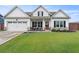 Inviting one-story home with manicured lawn, two-car garage and a cozy front porch perfect for relaxing outdoors at 39 Summer Nw Pl, Cartersville, GA 30121
