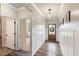 Inviting foyer with wood floors, leading to other rooms, showcasing the home's open layout and design elements at 39 Summer Nw Pl, Cartersville, GA 30121