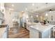 Bright kitchen with stainless steel appliances and a large island with bar seating at 39 Summer Nw Pl, Cartersville, GA 30121