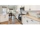 Modern kitchen features white cabinets and stainless-steel appliances at 39 Summer Nw Pl, Cartersville, GA 30121