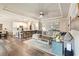 Open-concept living area with large couch and an adjoining kitchen area at 39 Summer Nw Pl, Cartersville, GA 30121