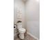 Cozy powder room featuring tiled floors and rustic decor at 39 Summer Nw Pl, Cartersville, GA 30121