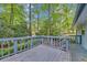 Spacious wooden deck overlooking a private backyard, perfect for outdoor entertaining and relaxation at 4856 Rock Haven Dr, Lilburn, GA 30047