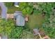 Birds eye view of fenced backyard, mature trees, a playset, fire pit, and outdoor living spaces at 2640 Garland Way, Duluth, GA 30096