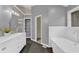 Stunning bathroom featuring a standalone tub, walk-in shower, and stylish design elements at 2640 Garland Way, Duluth, GA 30096