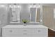 Updated bathroom with double vanities, marble countertops, and modern fixtures at 2640 Garland Way, Duluth, GA 30096