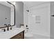 Elegant bathroom featuring modern fixtures, subway tile, and a marble-topped vanity at 2640 Garland Way, Duluth, GA 30096