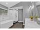 Beautiful bathroom featuring a soaking tub, glass enclosed shower, and stylish fixtures at 2640 Garland Way, Duluth, GA 30096