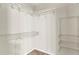 Walk-in closet providing ample storage space, with installed shelving and organization system at 2640 Garland Way, Duluth, GA 30096
